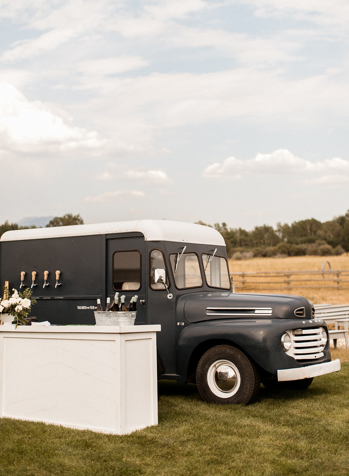 Black beer truck with beer on tap 