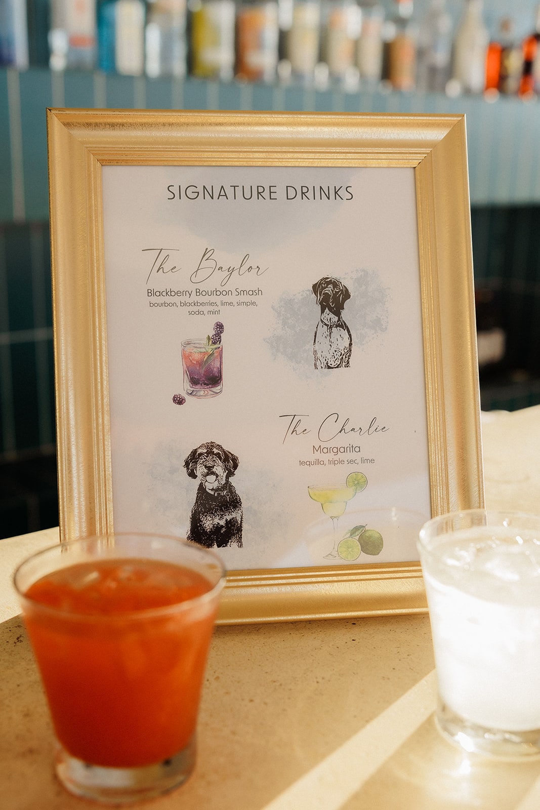 Signature drink menu with dog photos at Jamaica wedding cocktail hour 