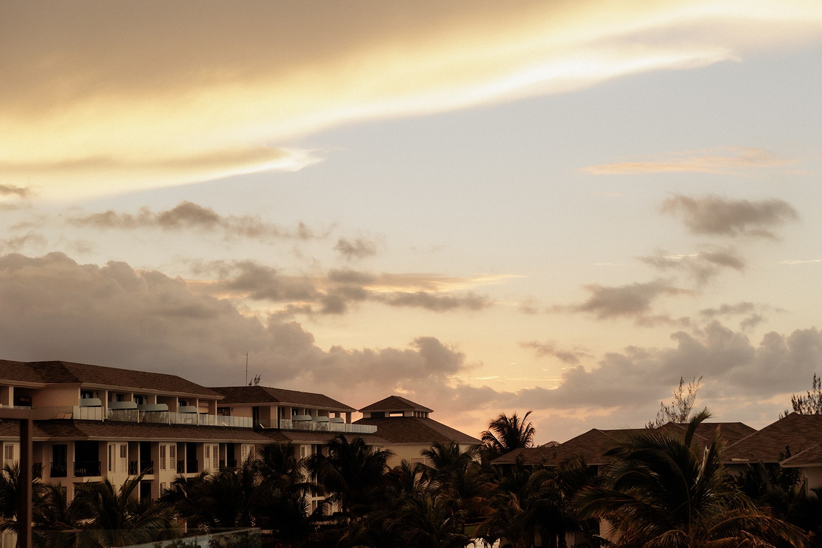 Excellence Oyster Bay resort hotel surrounded by palm trees