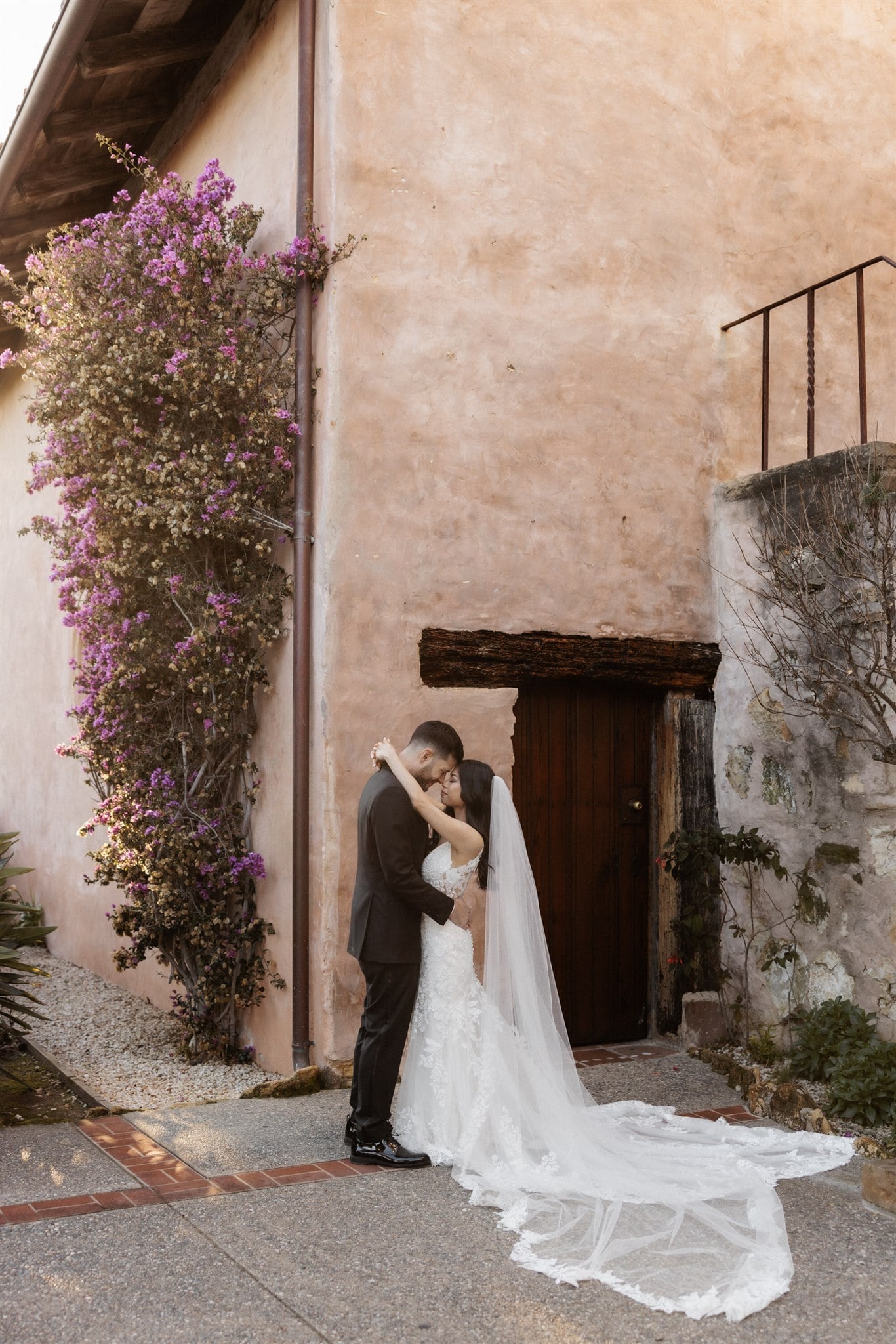 Bride and groom hug during their Puglia wedding